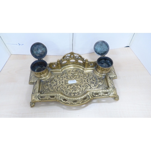 26 - Brass embossed desk stand and a Victorian book slide.