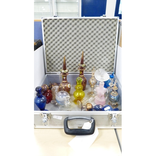 3 - Collection of scent bottles to include enamelled examples etc., in hard carrying case.