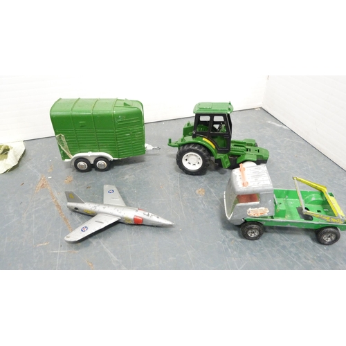 32 - Plastic box containing playworn and other vehicles, Rocky Mountain battery-operated locomotive and a... 