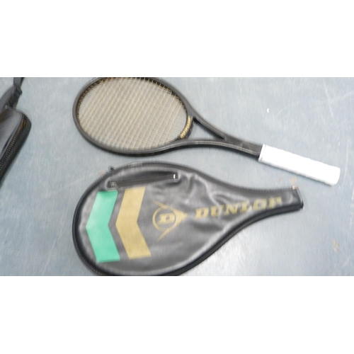 39 - Two cased tennis racquets, black backpack etc.