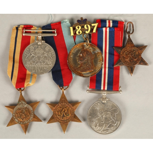 152 - Assorted medals including 1939-1945 star, Africa star, George VI medal, Defence medal WWII, and an 1... 