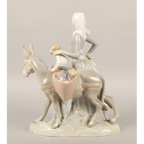 242 - Large Lladro figure of a mother and child with donkey