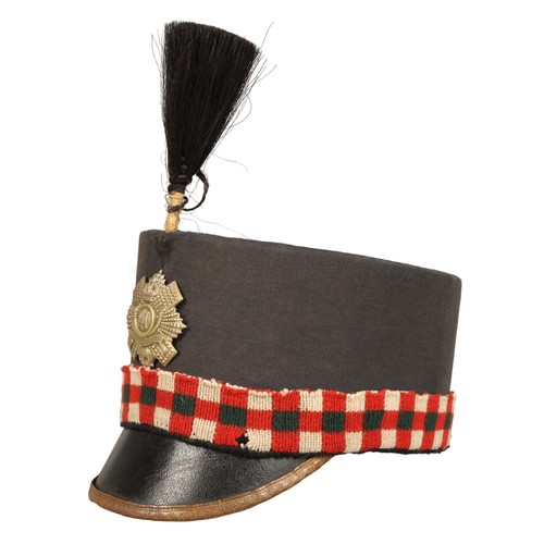 Highland Light Infantry shako cap with badge and feather hackle, in carrying tin