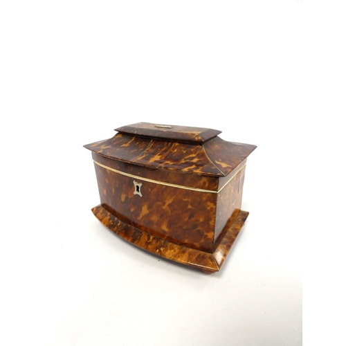 320 - Tortoiseshell and ivory inlaid tea caddy, circa early 19th century, of pagoda shape, the hinged top ... 