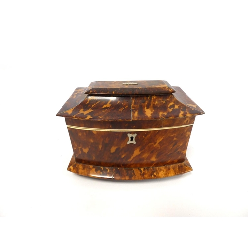 320 - Tortoiseshell and ivory inlaid tea caddy, circa early 19th century, of pagoda shape, the hinged top ... 