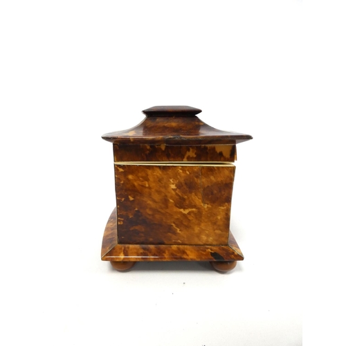 320 - Tortoiseshell and ivory inlaid tea caddy, circa early 19th century, of pagoda shape, the hinged top ... 