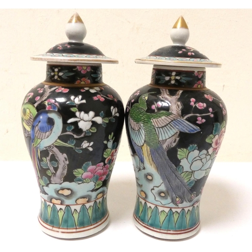 228 - Chinese famille noir porcelain garniture, to include a pair of Gu shaped vases, and a pair of small ... 