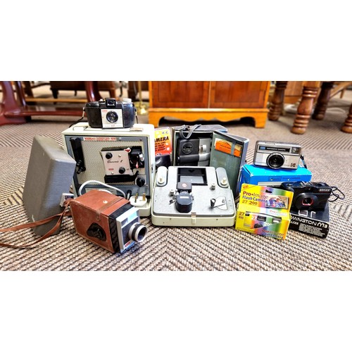 340 - Kodak Brown 8 Movie Projector, other assorted cameras, accessories etc.