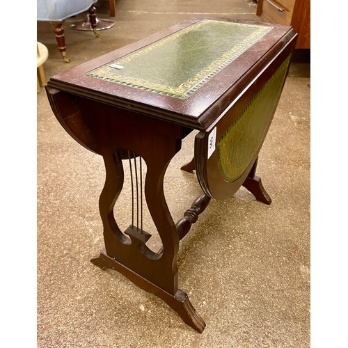 595 - Drop leaf occasional table with green leather inserts