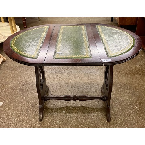 595 - Drop leaf occasional table with green leather inserts