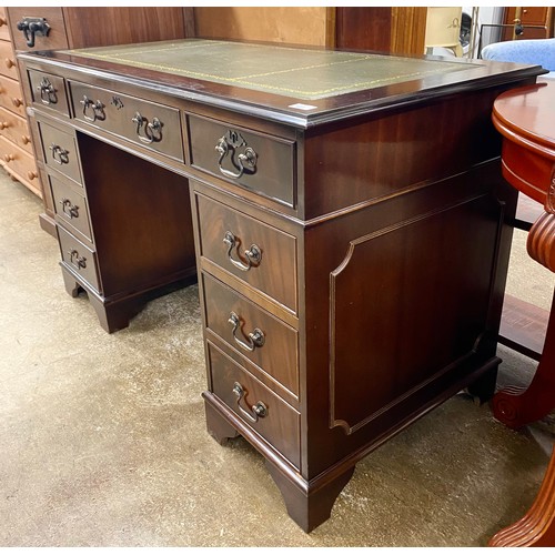 601 - Pedestal desk with leather skiver fitted seven drawers. 75cm h x 122cm w x 60cm d