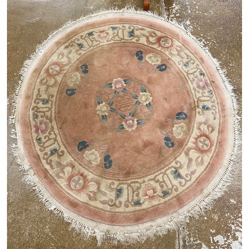 606 - Pink ground circular Chinese rug