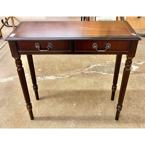 609 - Mahogany side table fitted frieze drawers.