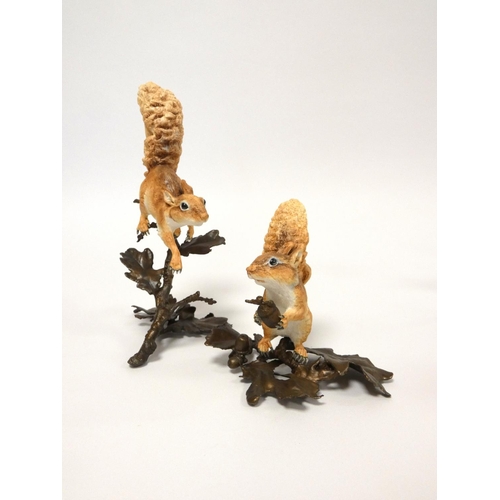 190 - Albany fine bone china painted figures of red squirrels on bronze foliate bases, designed by Neil Ca... 