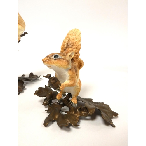 190 - Albany fine bone china painted figures of red squirrels on bronze foliate bases, designed by Neil Ca... 