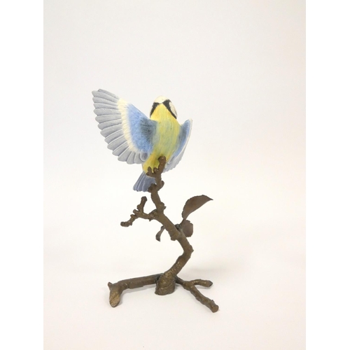 193 - Albany fine bone china painted bird figures on bronze foliate bases to include Kingfisher, Blue Tit,... 