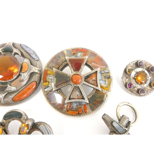 77 - Group of Scottish silver pebble jewellery to include a circular plaid brooch with central cross, sen... 