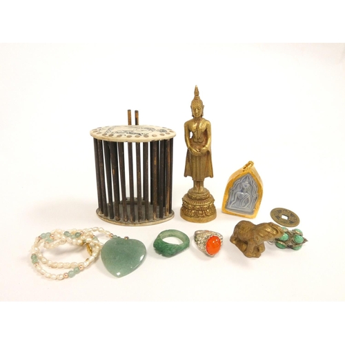 80 - Oriental jewellery to include a carved nephrite ring, Thai standing Buddha figure, silver Tibetan ca... 