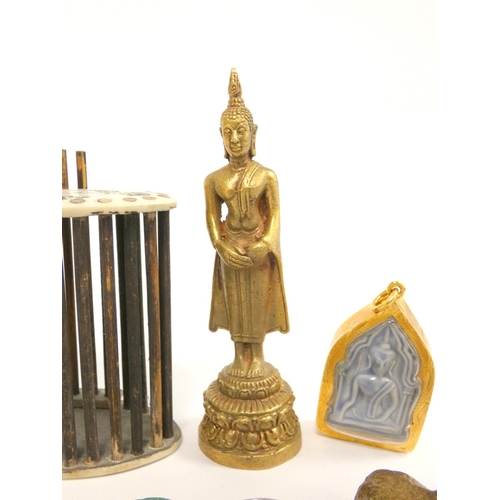 80 - Oriental jewellery to include a carved nephrite ring, Thai standing Buddha figure, silver Tibetan ca... 