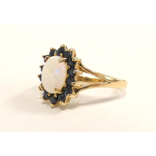 85 - 9ct gold opal and sapphire cluster ring, Size L 2.3g 