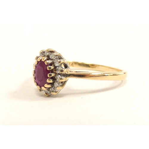 86 - Hallmarked 9ct gold ruby and diamond cluster ring, size O 2.6g .15ct 