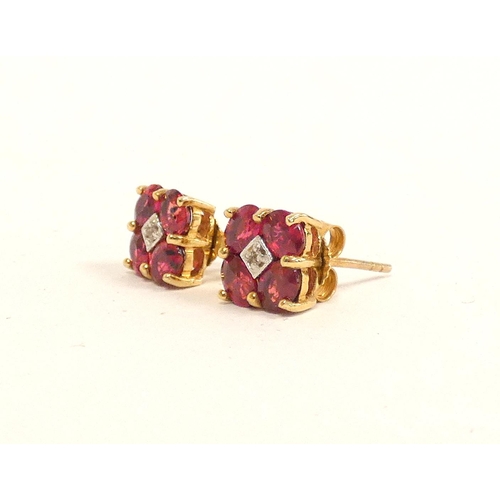 88 - Pair of hallmarked 9ct gold ruby and diamond earrings, 1.7g