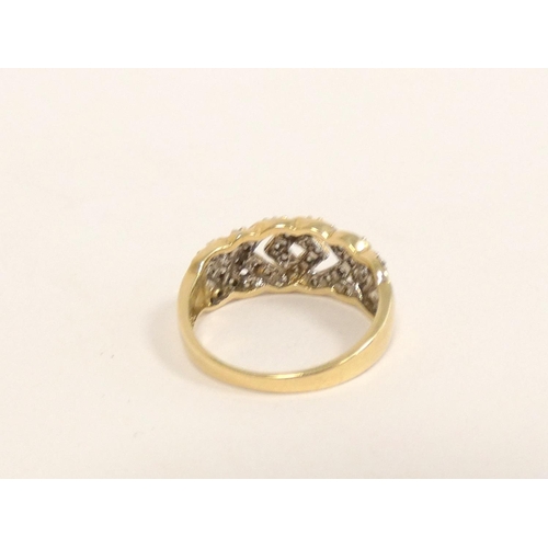 91 - Hallmarked 9ct gold diamond woven knot design ring, size 'Q½', 3.5g