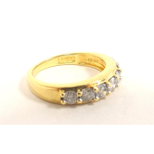 92 - 18ct gold hallmarked seven stone diamond ring, .75ct size 'K', 4.1g