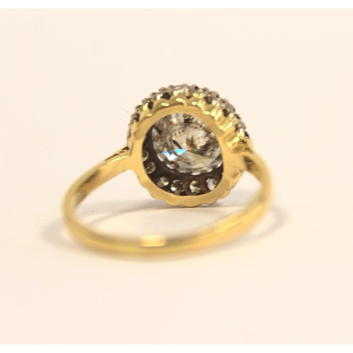 93 - 18ct gold diamond cluster ring, the centre brilliant cut stone measuring 1.6cts, encircled by smalle... 