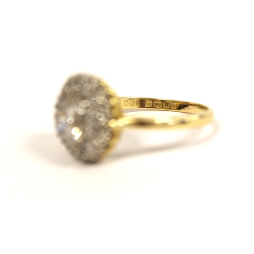 93 - 18ct gold diamond cluster ring, the centre brilliant cut stone measuring 1.6cts, encircled by smalle... 