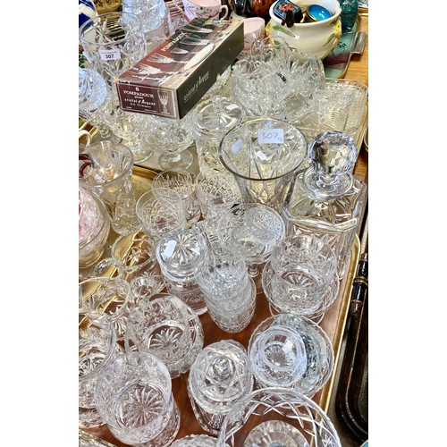 307 - Large quantity of cut glass crystal to include decanter, vases, ashtrays, jugs, sugar bowls, two tra... 