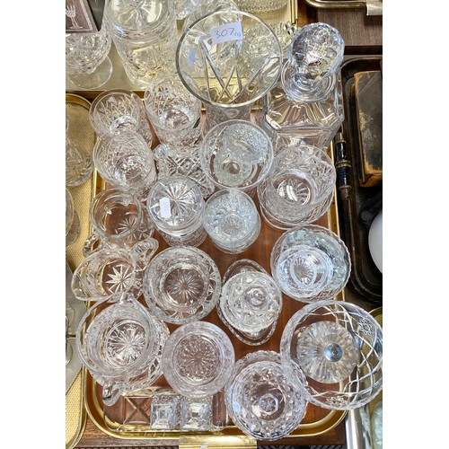 307 - Large quantity of cut glass crystal to include decanter, vases, ashtrays, jugs, sugar bowls, two tra... 