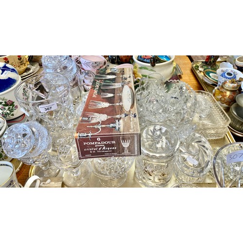 307 - Large quantity of cut glass crystal to include decanter, vases, ashtrays, jugs, sugar bowls, two tra... 