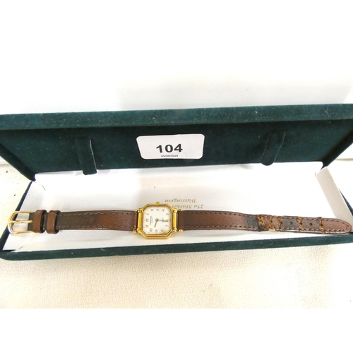 104 - Ladies Raymond Weil watch with leather strap.