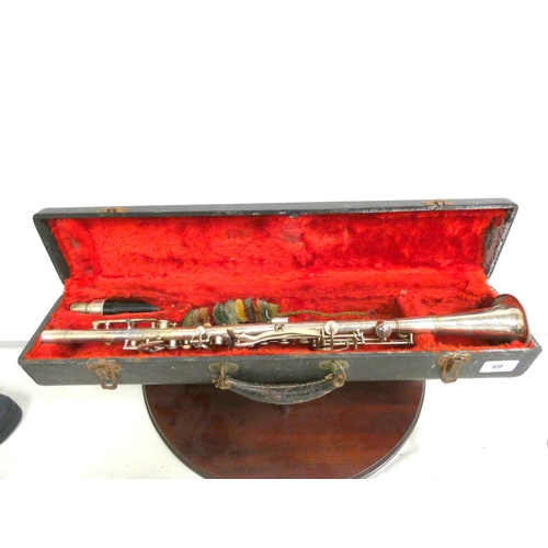 69 - Antique silver plated USA made, clarinet in case.