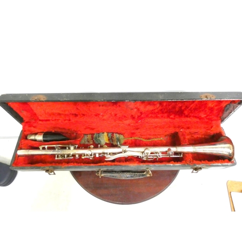 69 - Antique silver plated USA made, clarinet in case.