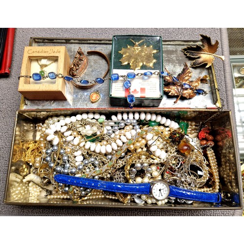 160 - Large assortment of costume jewellery including 24K gold plated Canadian leaf, etc
