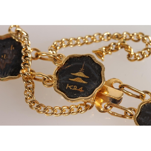 510 - Japanese damascene work gold and silver inlaid on steel bracelet with butterfly link and a similar b... 