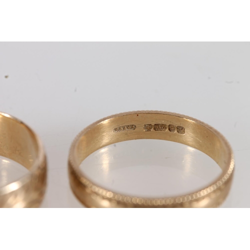 516 - Two 9ct gold wedding bands, gross 4.7g.