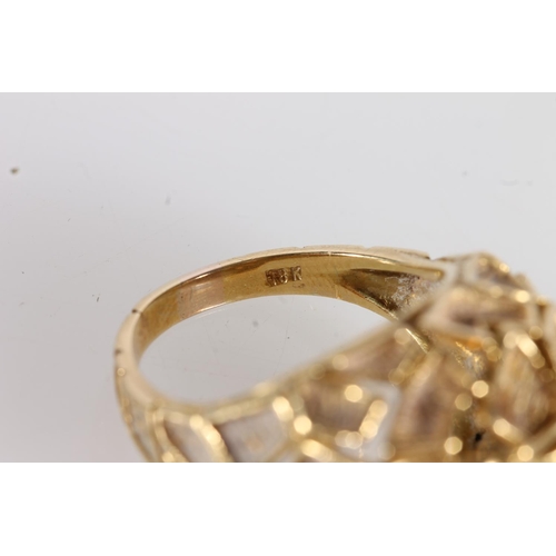 522 - 18ct gold textured modernist ring, 9.8g.