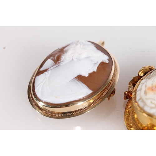 538 - Victorian shell cameo brooch in scrolled yellow metal frame together with a later 20thC shell cameo ... 