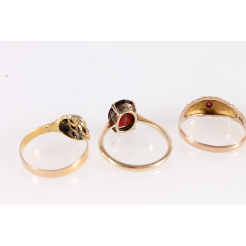 544 - Four 9ct gold rings, 9.2g, together with an unmarked yellow metal and opal ring (5)