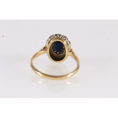 546 - 18ct gold onyx and diamond cluster ring, size O, 4.1g.