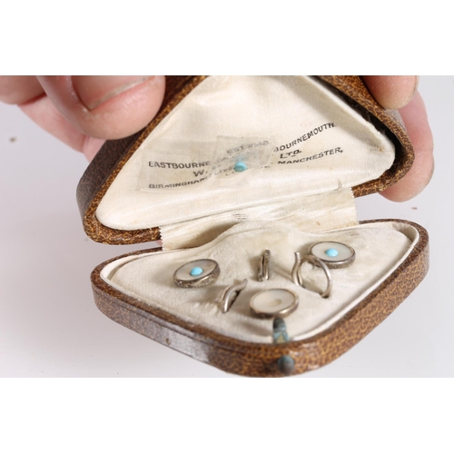 565 - Three Edwardian mother of pearl and turquoise button studs in original case.