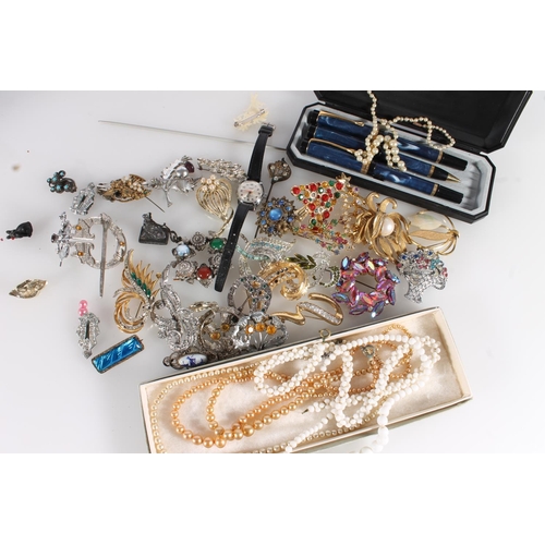 572 - Box of costume jewellery together with a marbled pen set