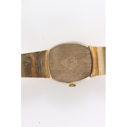 574 - Reproduction gold plated watch.