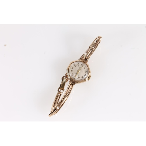 577 - Fortex 'A' 9ct gold cased ladies dress watch on 9ct gold extender bracelet, gross 16.2g.