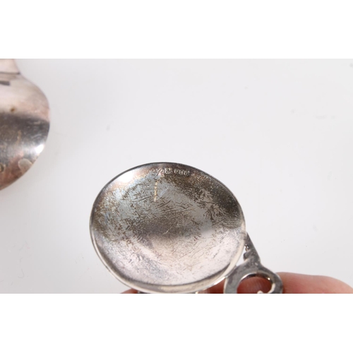 583 - Hallmarked Scottish silver caddy spoon with Luckenbooth type handle, together with a hallmarked A. E... 