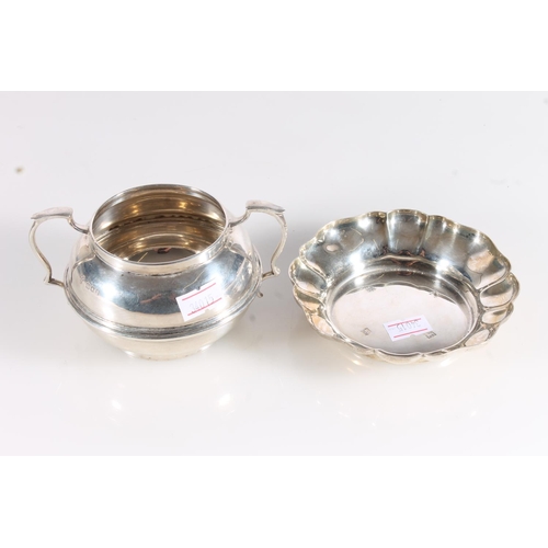 587 - Hallmarked silver small finger bowl and a silver two handled vase, gross 192g.