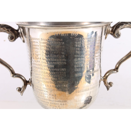 588 - Geo. V silver trophy for the Lord Dunglass trophy 1924, etched winners names running to 1998, on bla... 